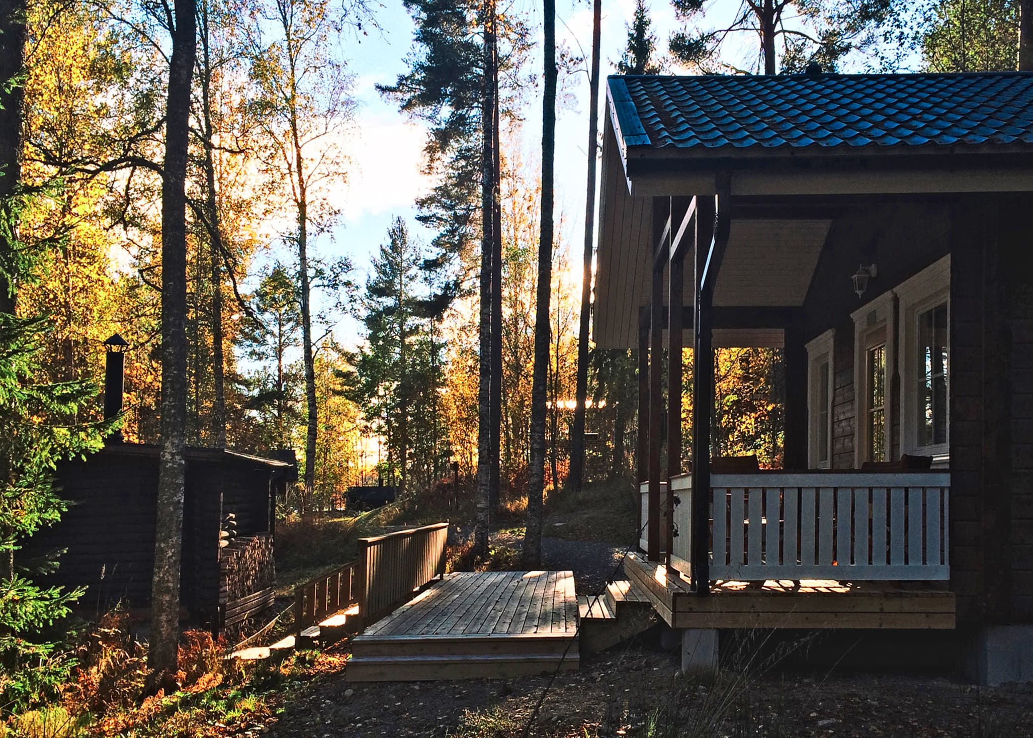 Terrace and grill shelter at Lake Cottage in the summer.